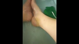 Scrubbing my toes and soles