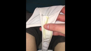Whore shows her Slutty Panties. Sleazy thong and pissing